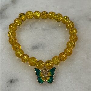 Yellow Beaded Bracelet with Green Butterfly Charm